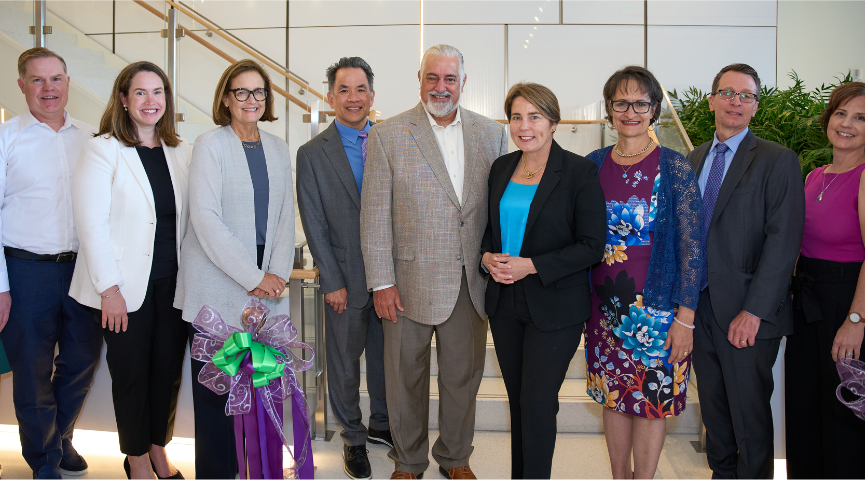 Photo: Members of the Ultragenyx team join Massachusetts Governor Maura Healey at the ribbon-cutting ceremony.